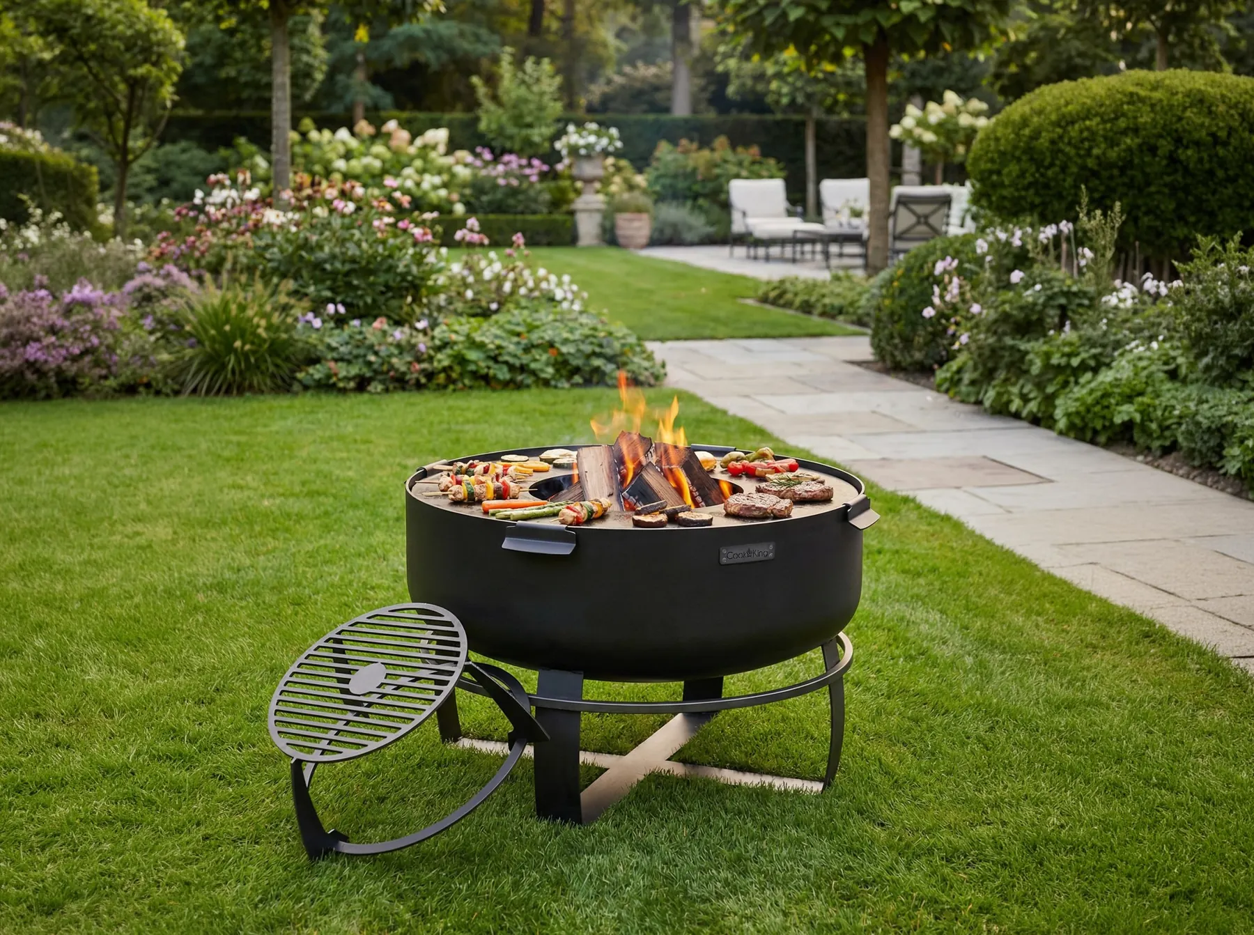 Fire bowlwith a grill grate on a garden lawn